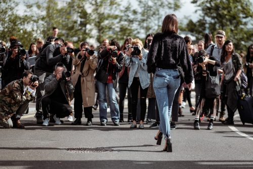 Woman walking towards paparazzi | Private Practice: From Opening Your Door To Paid Clients Within 7 Days | Brighter Vision Web Solutions | Therapist Websites & Marketing for Therapists | Marketing Blog for Therapists