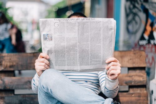 Person hiding behind newspaper | Private Practice: From Opening Your Door To Paid Clients Within 7 Days | Brighter Vision Web Solutions | Therapist Websites & Marketing for Therapists | Marketing Blog for Therapists