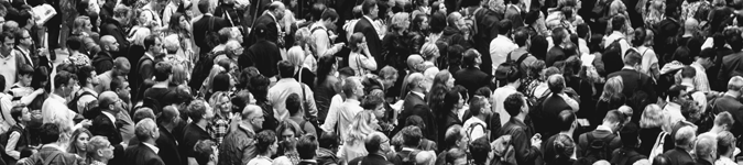 Black and white crowd | Which Markets Your Practice Better? Paid vs. Unpaid Social Media Posts | Brighter Vision Web Solutions | Marketing Blog for Therapists