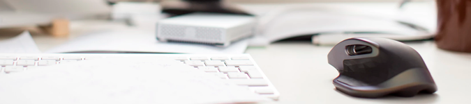 White keyboard, black mouse | 5 Ways to Freshen Up Your Private Practice & Attract New Clients | Brighter Vision Web Solutions | Marketing Blog for Therapists