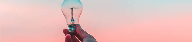 hand holding light bulb | The Best Practices for Therapist Marketing on LinkedIn in 2019 | Brighter Vision Marketing Blog for Therapists | Therapist Websites & Marketing for Therapists