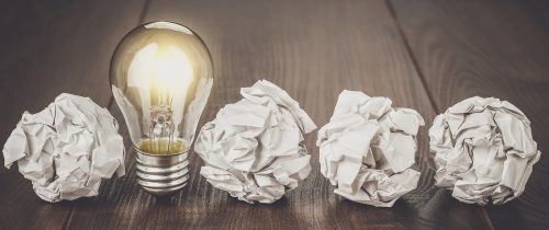 Paper balls, lightbulb | 6 Steps to a Compelling Blog for Your Therapist Website | Brighter Vision | Marketing Blog for Therapists