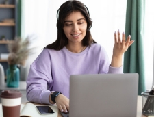 Therapist on a video call using laptop