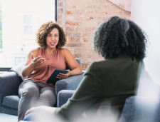 Therapist speaking to a client