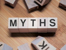 Wooden blocks spelling out "myths"